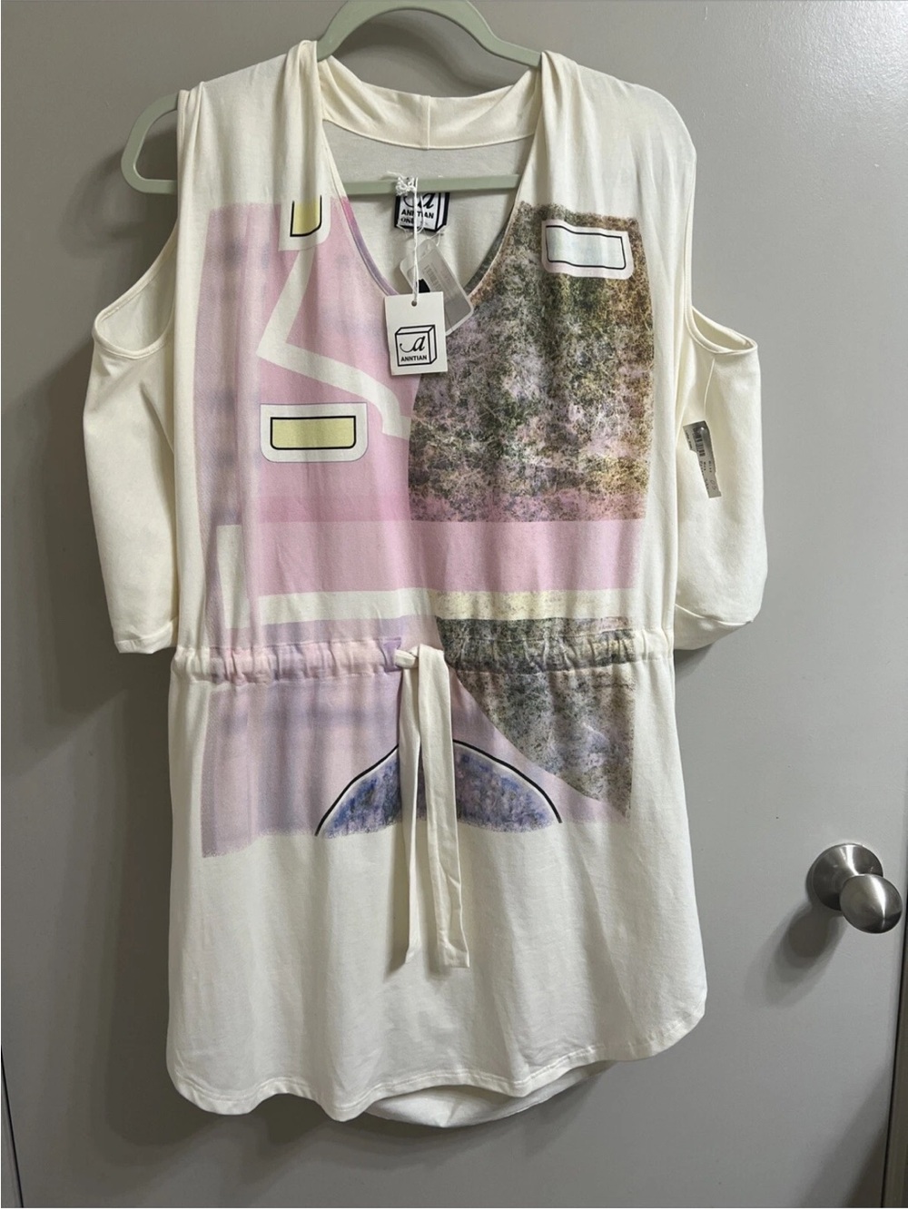 Cold-Shoulder Graphic Drawstring Tunic in Cream and Pink OS